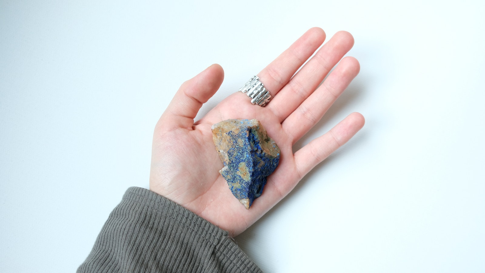 Woman showing Azurite in hand