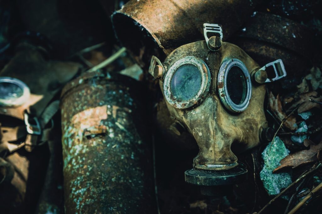 shallow focus photography of gas mask
